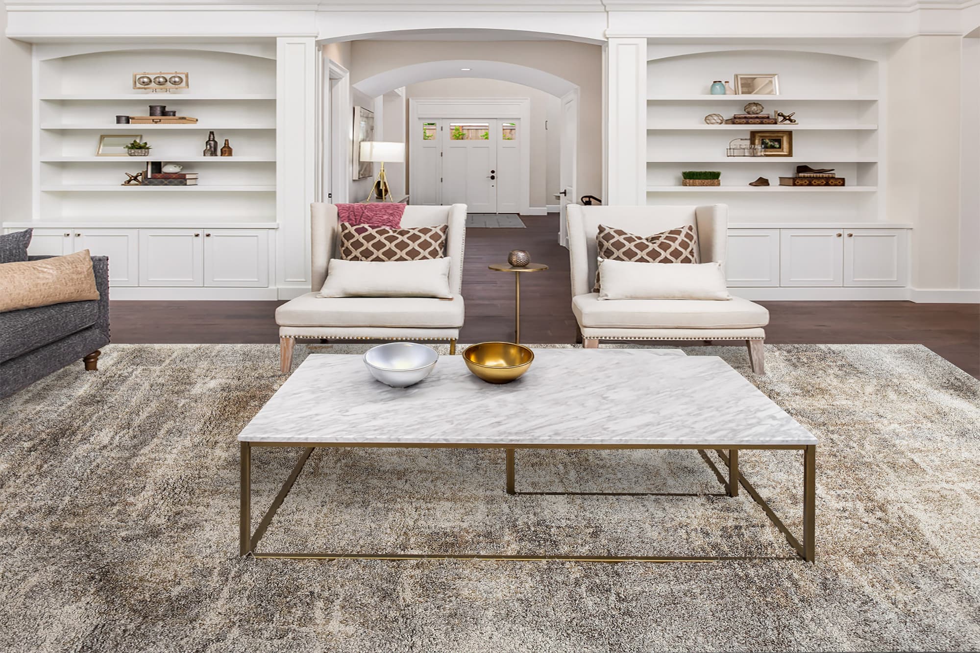 Orchard, a Mehari decolan polypropylene rug in ivory/rust/multi, styled in a room
